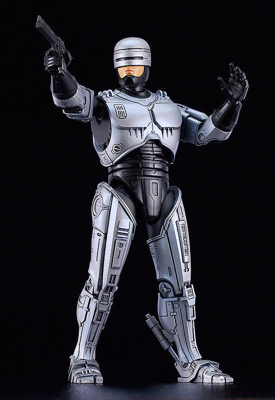 Dynamic tactical pose of the RoboCop 3 figure with the Auto 9 weapon raised and visor detail visible.