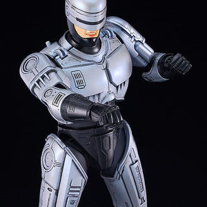 Close-up action shot of the RoboCop 3 figure in a combat-ready stance with fists clenched.