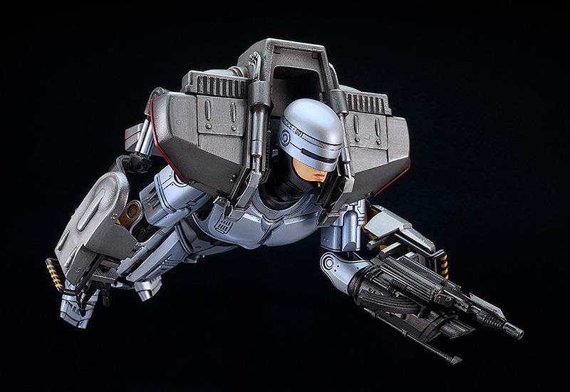 Action pose of the RoboCop 3 model kit flying forward using the jetpack and specialized forward-facing head parts.