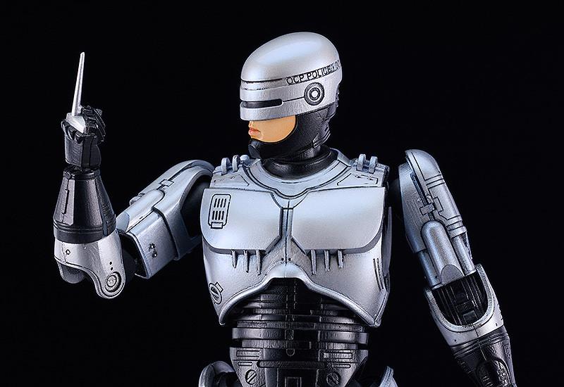 Detailed close-up of the RoboCop figure using the interchangeable data spike hand accessory.