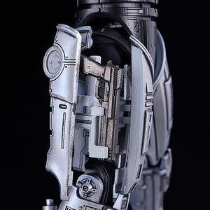 Close-up of the RoboCop Moderoid's right thigh showing the deployed holster part with the Auto 9 stored inside.