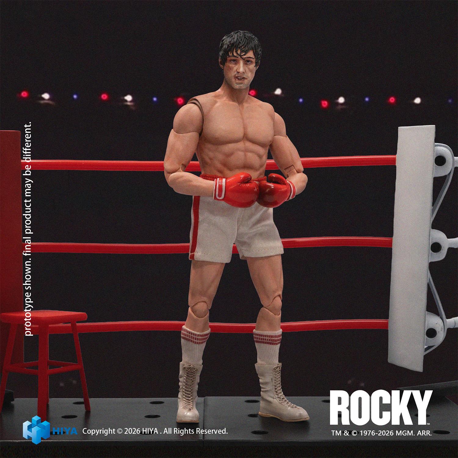 Front view of Hiya Toys Rocky Balboa 1/12 action figure with battered face sculpt wearing white boxing shorts and red gloves.