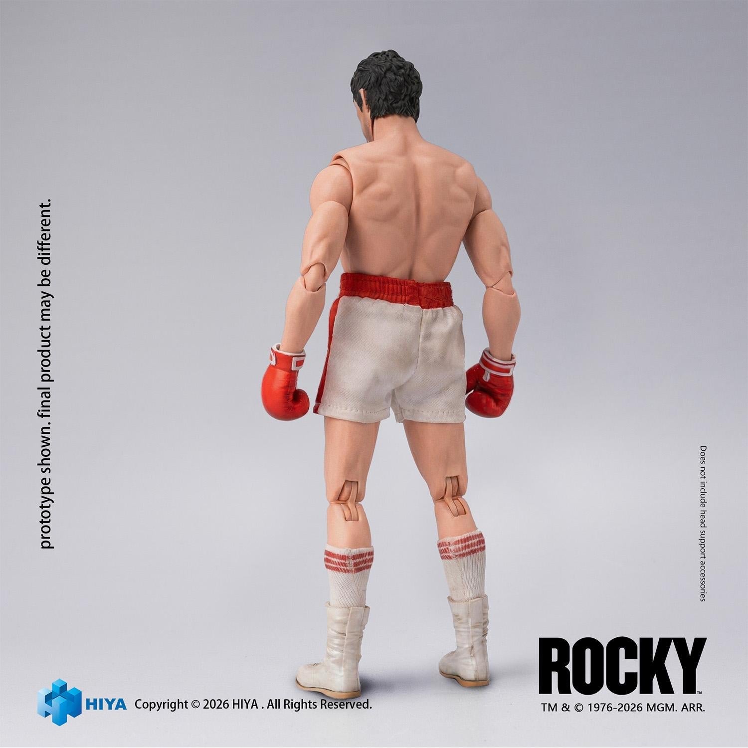 Rear view of the Hiya Toys Rocky Balboa action figure showcasing back muscle sculpt and white boxing shorts.