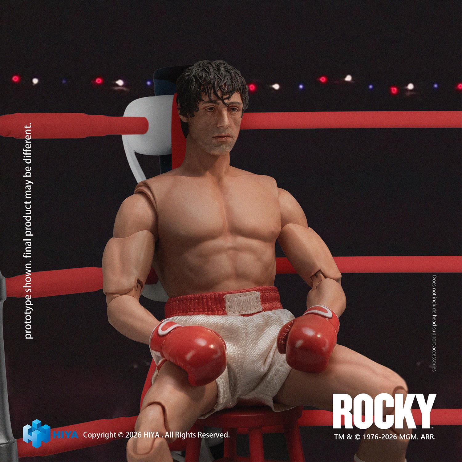 Close-up of Rocky Balboa 1/12 scale figure seated on a red corner stool inside the boxing ring diorama.