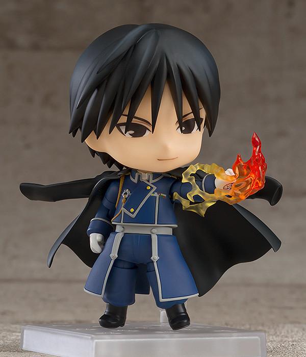 Flame Alchemist Roy Mustang Nendoroid in a finger-snapping pose with a translucent orange and yellow fire effect part attached to his hand.