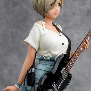 Close-up of the upper body of Rupa figure highlighting the fabric textures of her stylish casual outfit.