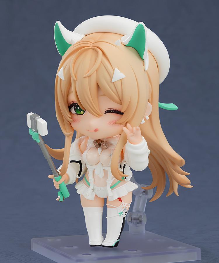 Nendoroid Rupee Winter Shopper in a playful pose with her tongue-out winking face plate and peace sign hand.