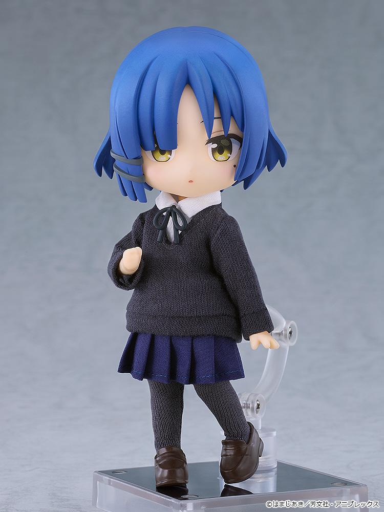 Articulated Ryo Yamada Nendoroid Doll figure standing in her dark grey fabric school uniform on a clear magnetic display base against a soft grey studio backdrop.