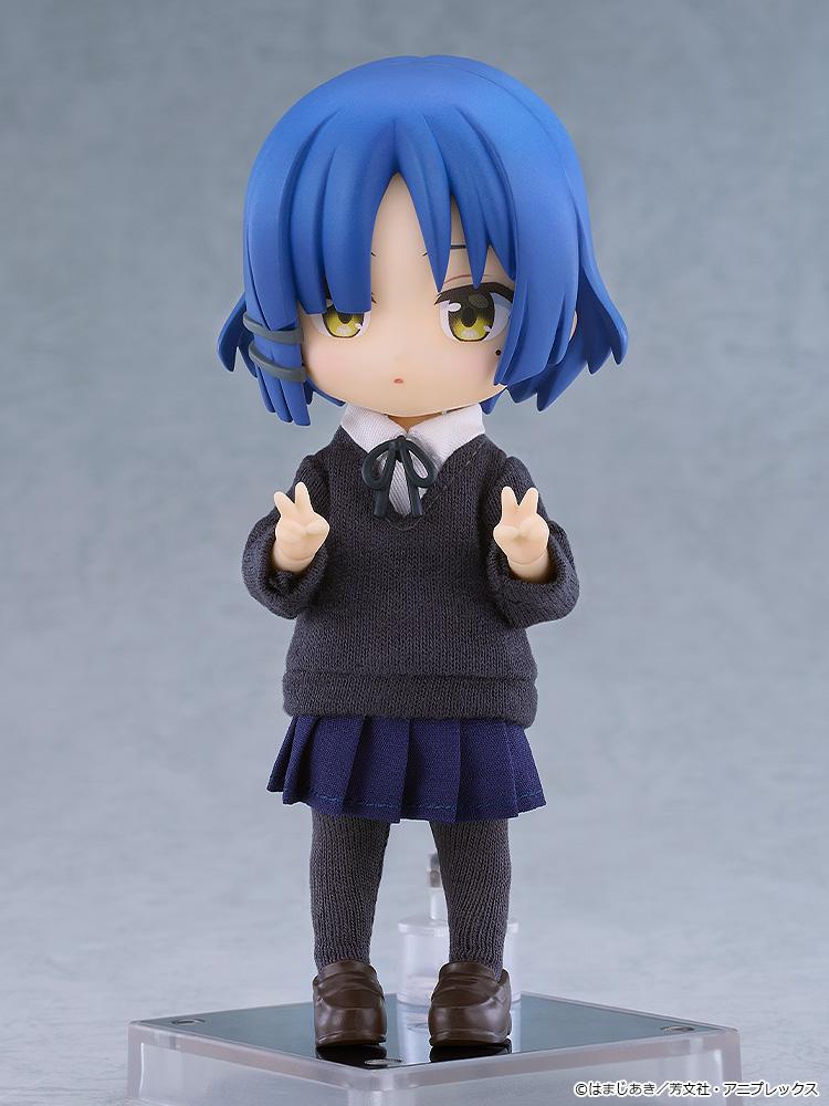 Front view of the Ryo Yamada Nendoroid Doll figure calmly making double peace signs while mounted on a clear magnetic support stand.