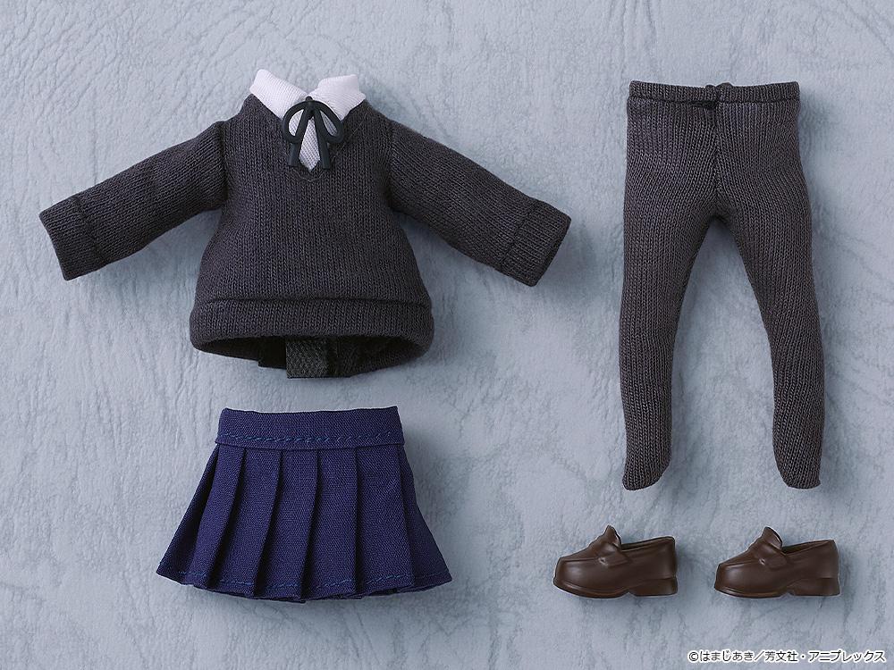 Flat lay view of the complete fabric box contents for the Ryo Yamada Nendoroid Doll, showcasing the uniform top, pleated skirt, dark grey full-length tights, and brown loafers.