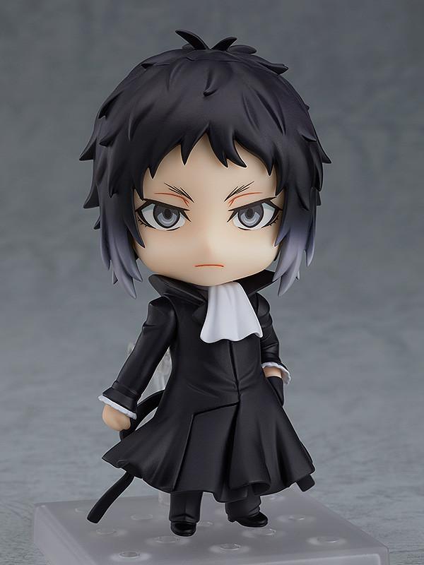 Full view of the Ryunosuke Akutagawa Nendoroid standing on a clear display base in a stoic pose.