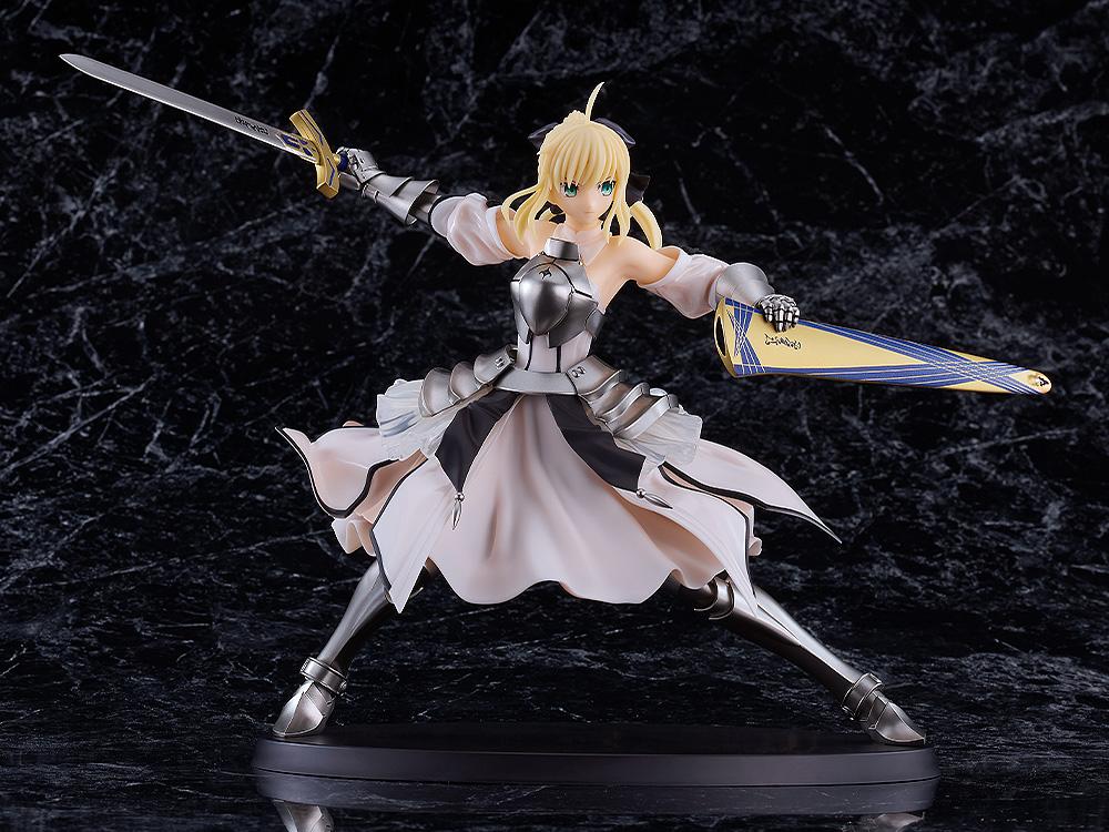 Angled view of the assembled Saber Lily model kit holding Excalibur and Avalon in a combat stance.