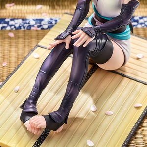 Top-down view of the Saber Okita Souji figure showing the intricate sculpting of the legs and the textured tatami mat base.