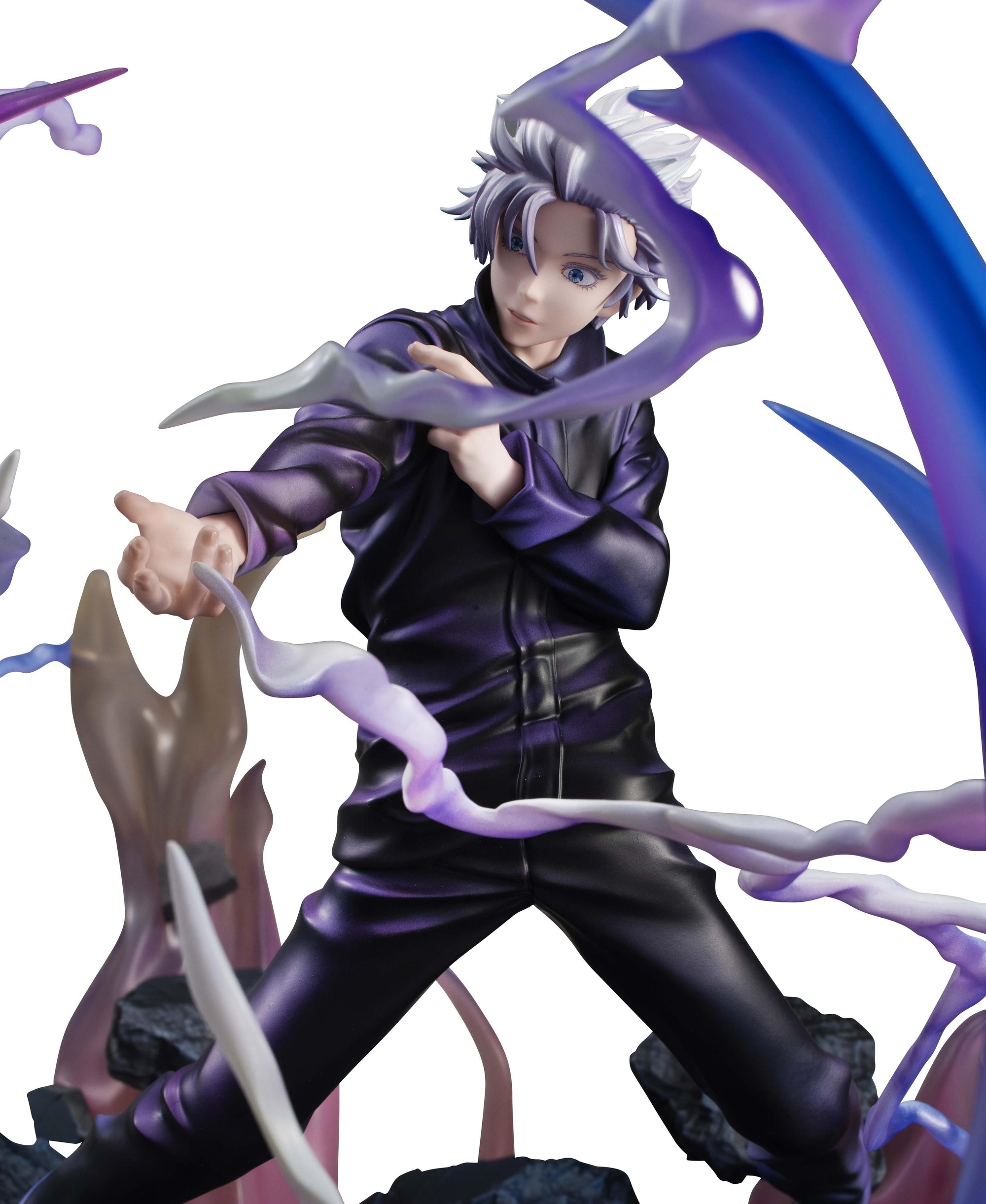 Mid-shot detail of Satoru Gojo in his battle pose with electricity and energy wisps surrounding the DX figure.