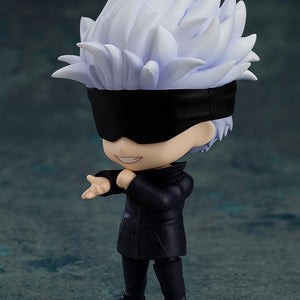 Dynamic side angle view of Satoru Gojo Nendoroid wearing his eye mask and pointing forward on a transparent base.