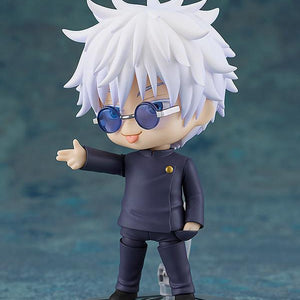 Satoru Gojo Nendoroid figure featuring a playful goading face plate with his tongue sticking out, pointing his hand forward with his glasses tilted down.