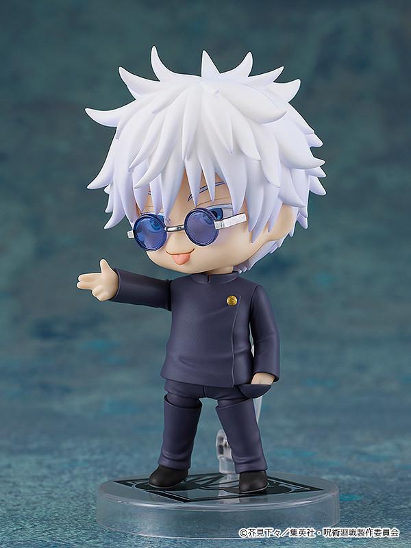 Satoru Gojo Nendoroid figure featuring a playful goading face plate with his tongue sticking out, pointing his hand forward with his glasses tilted down.
