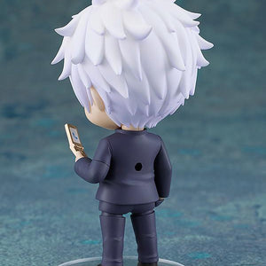 Rear studio shot of the Satoru Gojo Nendoroid figure highlighting the texture and layers of his spiky white hair and the clean cut of his school uniform jacket.
