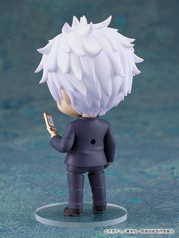 Rear studio shot of the Satoru Gojo Nendoroid figure highlighting the texture and layers of his spiky white hair and the clean cut of his school uniform jacket.