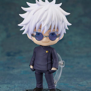 Full-body studio shot of the Satoru Gojo Nendoroid figure standing confidently on a custom clear base with a subtle smile while wearing his round sunglasses.