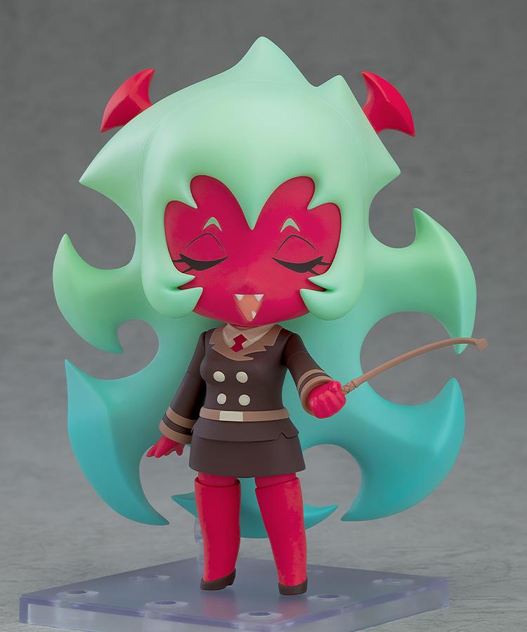 Close-up view of the Scanty Nendoroid anime figure showcasing a happy, closed-eyes smiling face plate while holding her whip accessory.