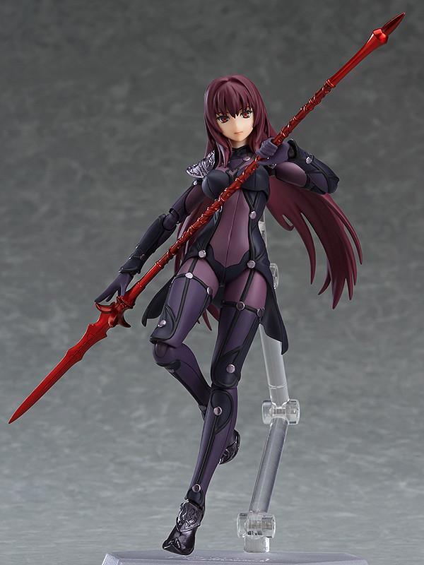 Front view of the Scathach figma Lancer figure with an expressionless look, posed on a clear articulated stand against a gray studio background.