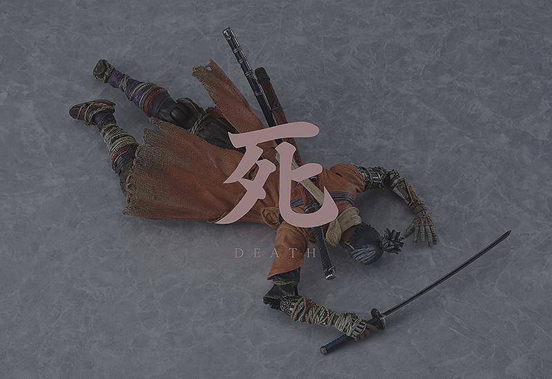 The figma Sekiro action figure in a defeated pose featuring the iconic red "DEATH" kanji effect sheet from the video game.