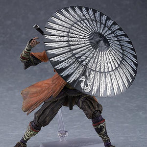 Highly articulated figma Sekiro figure in a defensive stance with the Loaded Umbrella shield prosthetic tool deployed.