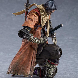 Profile shot of the figma Sekiro figure in a traditional shinobi kneeling pose, showcasing the high articulation of the DX edition.