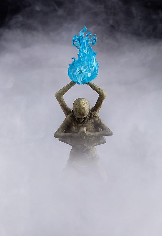 Cinematic close-up of the Sculptor's Idol accessory with a translucent blue flame effect amidst atmospheric smoke.
