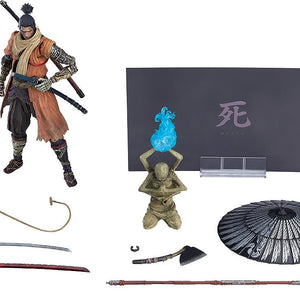 Full layout of the figma Sekiro DX Edition showing the shinobi action figure, Sculptor's Idol, and all prosthetic tool accessories.