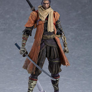 Neutral standing pose of the figma Sekiro figure highlighting the detailed shinobi prosthetic arm and weathered clothing textures.