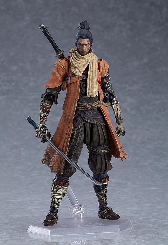 Neutral standing pose of the figma Sekiro figure highlighting the detailed shinobi prosthetic arm and weathered clothing textures.