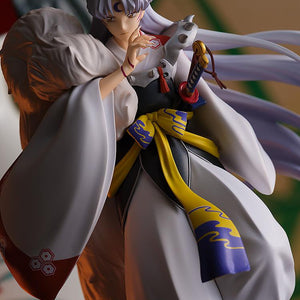 Dramatic mid-shot of Sesshomaru showing his calm expression, crescent moon forehead mark, and red face stripes.