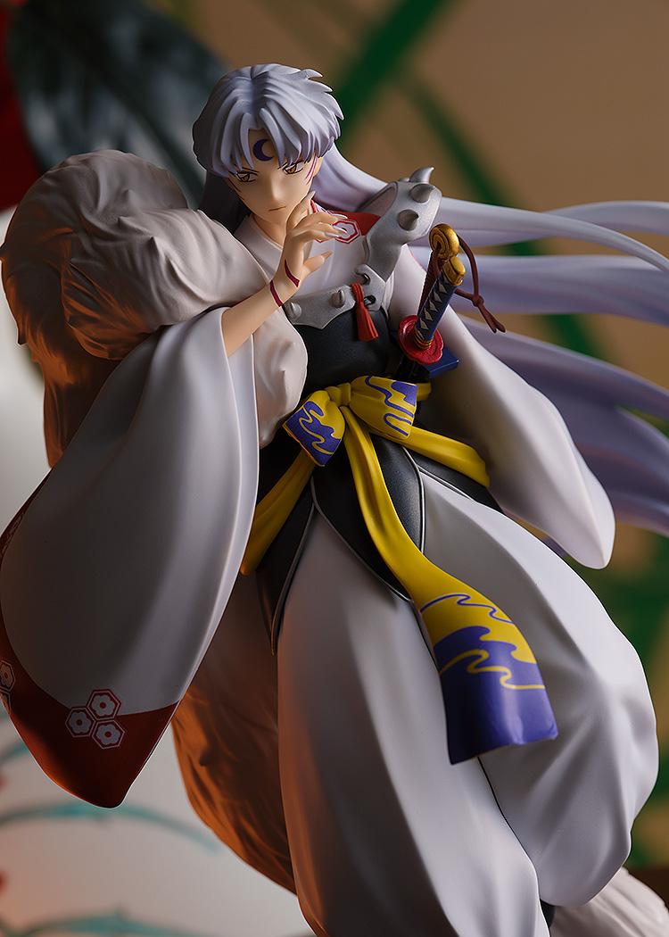 Dramatic mid-shot of Sesshomaru showing his calm expression, crescent moon forehead mark, and red face stripes.