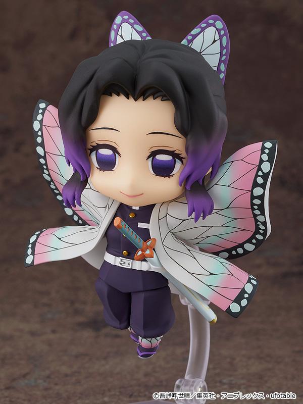 Dynamic mid-air pose of Shinobu Kocho Nendoroid with her haori spread out like butterfly wings.