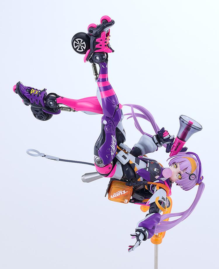 Inverted aerial stunt pose of the Motored Cyborg Runner SSX-155C Pop Tracker figure suspended on a support stand rod.