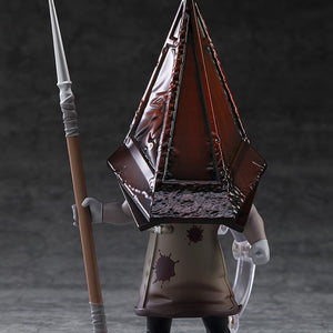 Front studio view of the Silent Hill 2 Red Pyramid Thing Nendoroid holding a long spear accessory vertically.