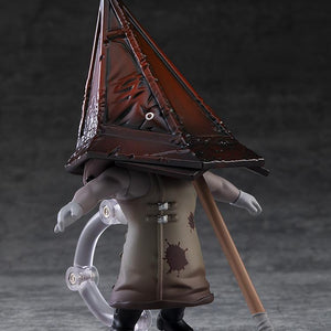Rear studio view of the Red Pyramid Thing Nendoroid figure showing the back of the blood-stained coat and metallic pyramid helmet.