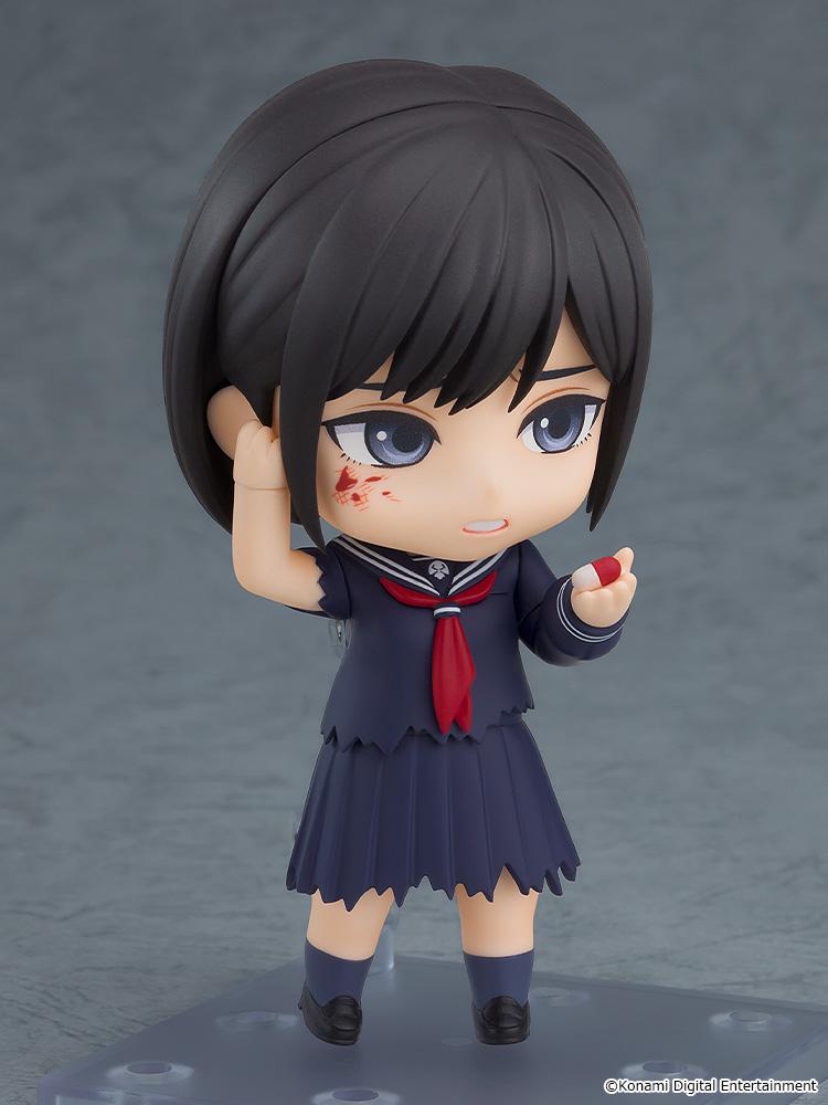 Hinako Shimizu Nendoroid figure with blood splatter on her cheek holding a red and white medicine capsule accessory.