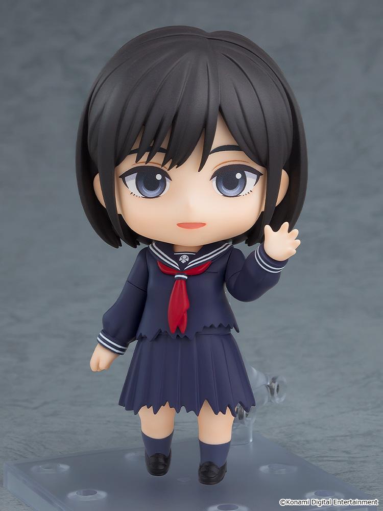 Hinako Shimizu Nendoroid figure displaying a gentle smiling face plate while raising her left hand in a waving gesture.