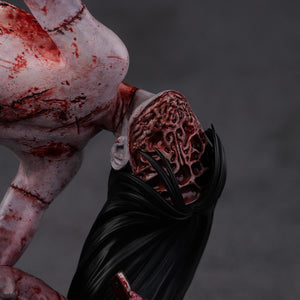 Tight detail shot of the sliced face option for the Kashimashi statue, showcasing the graphic and grotesque paintwork.