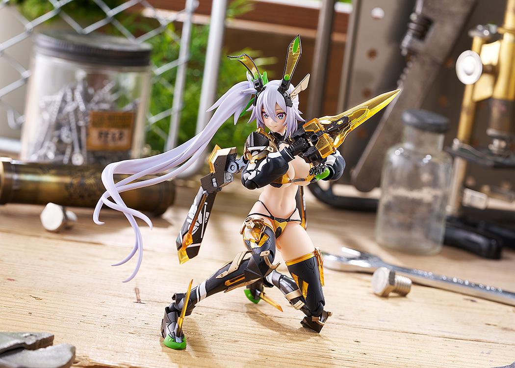 Kneeling action shot of the Silva Barrelline figma figure aiming her Photon C cestus weapon across a wooden table.