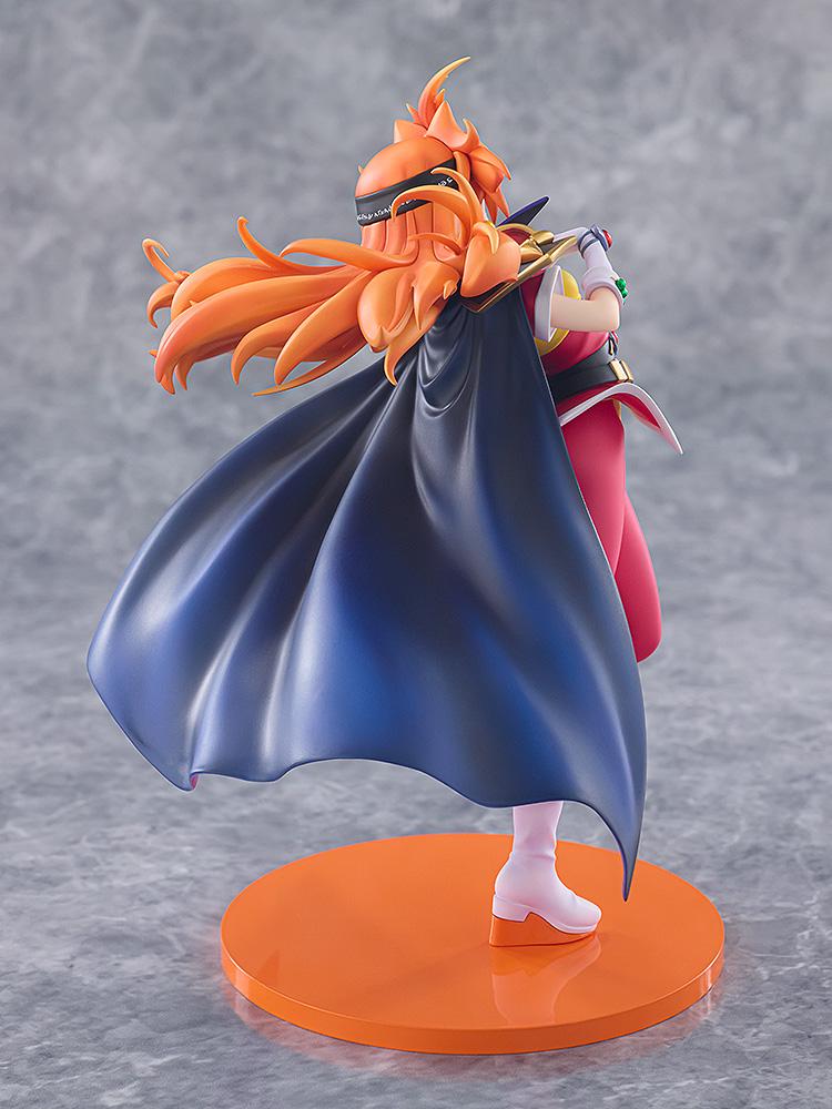 Rear view of the Slayers Lina Inverse light novel figure showing the wide dark blue cape and detailed back sculpt.