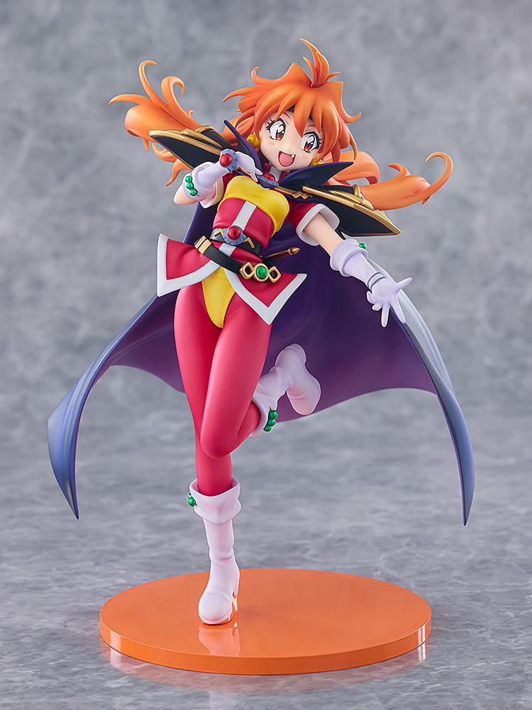 Full-body front shot of the Slayers Lina Inverse non-scale figure displayed on a round orange stand against a grey studio background.