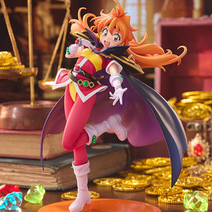 Promotional lifestyle display shot of the KDcolle Lina Inverse figure surrounded by gold coins, gems, and vintage books.