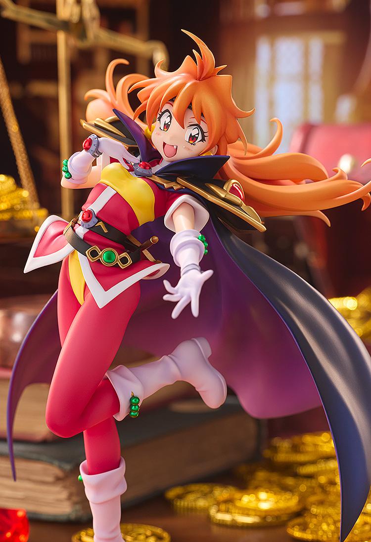 Medium lifestyle photo of the energetic Slayers Lina Inverse figure featuring gold coins and warm ambient lighting.