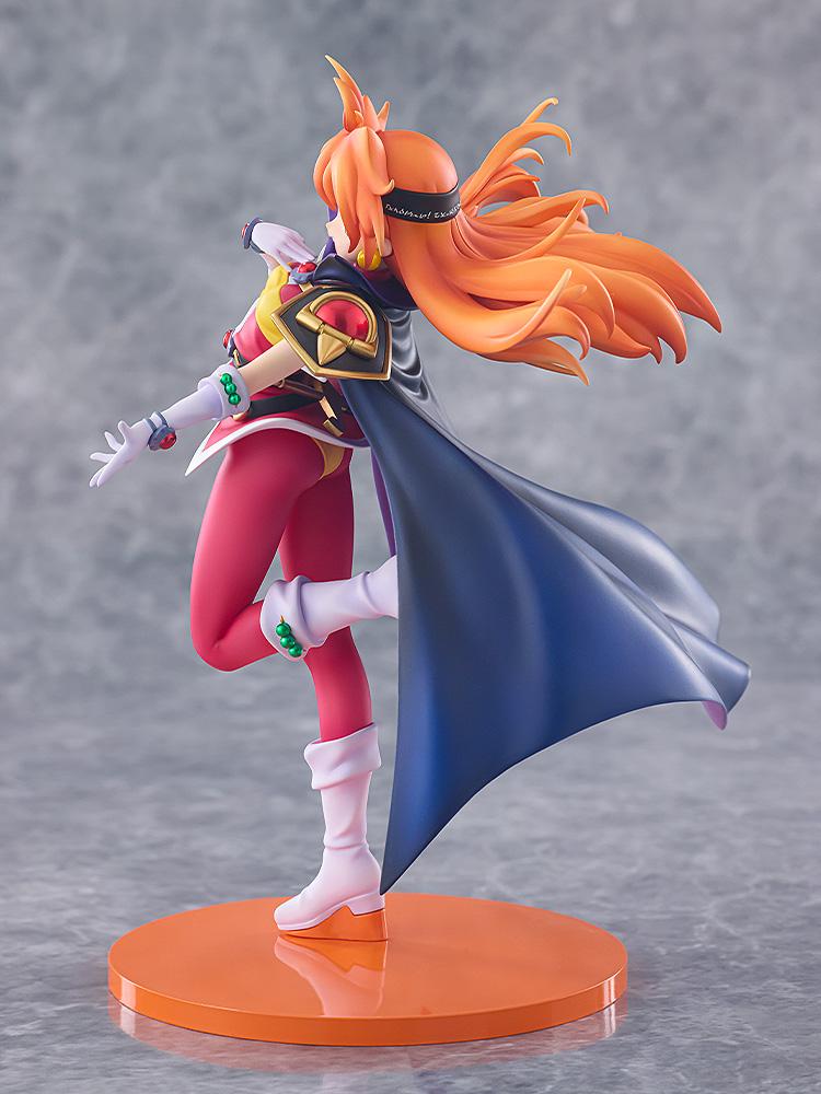 Side-angle view of the Lina Inverse figure highlighting her flowing orange hair, headband, and dark blue cape.