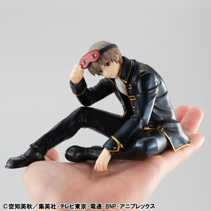Sogo Okita figure held in a hand to demonstrate the 3.15-inch Tenohira palm-size scale.