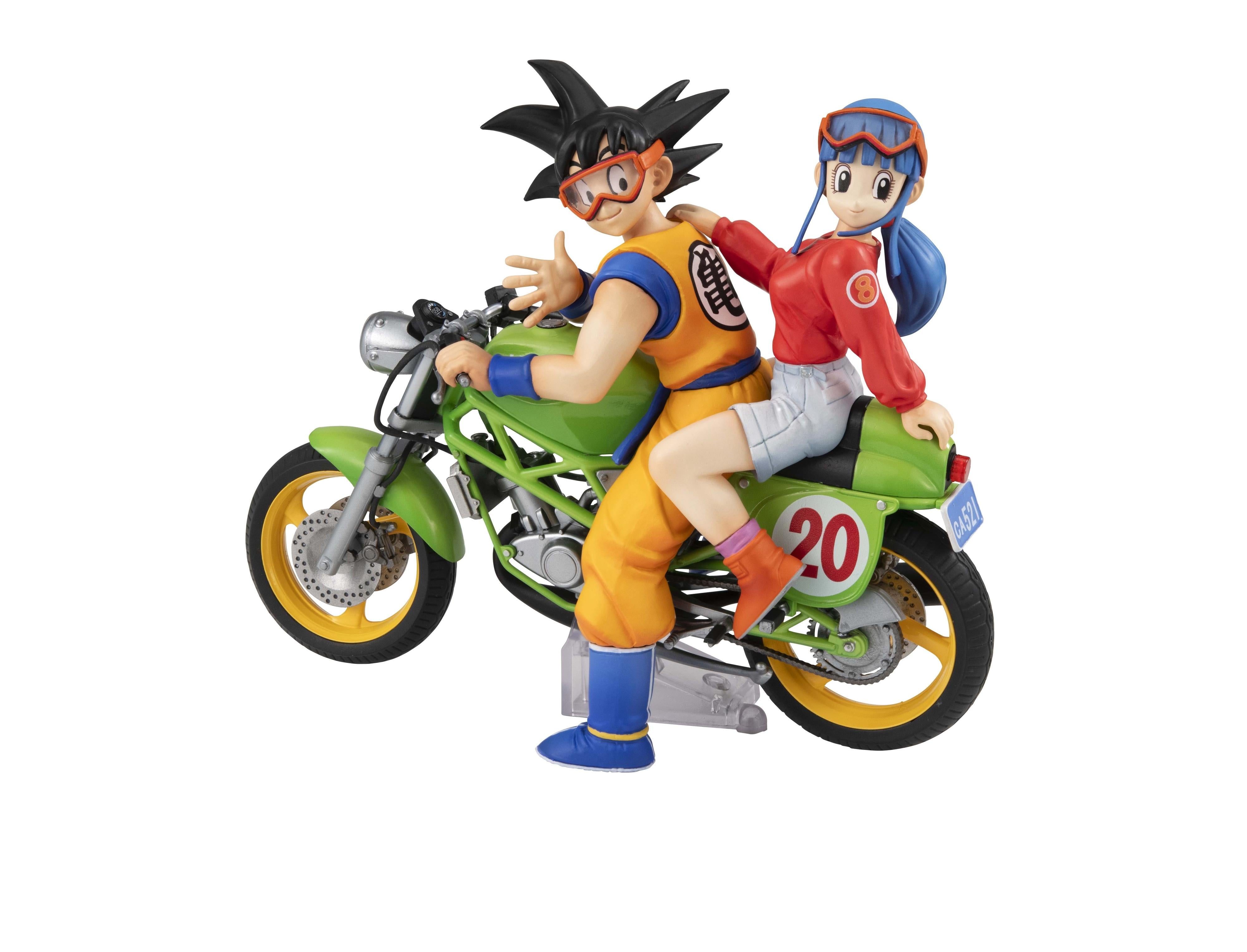 Three-quarter rear shot of the Goku and Chi-Chi collectible statue on a white background, featuring the "20" decal and "CA521" license plate.